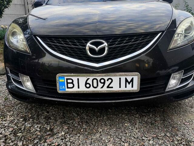 Черный Мазда 6, объемом двигателя 2 л и пробегом 230 тыс. км за 6900 $, фото 1 на Automoto.ua