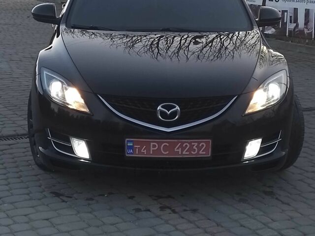 Черный Мазда 6, объемом двигателя 2.2 л и пробегом 235 тыс. км за 7220 $, фото 1 на Automoto.ua
