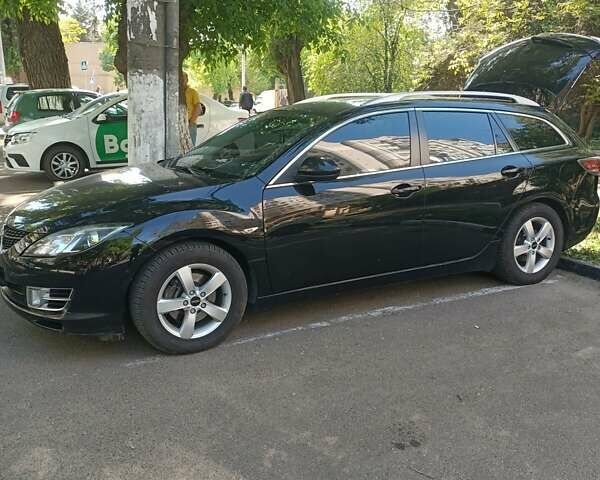 Черный Мазда 6, объемом двигателя 2 л и пробегом 240 тыс. км за 8000 $, фото 1 на Automoto.ua