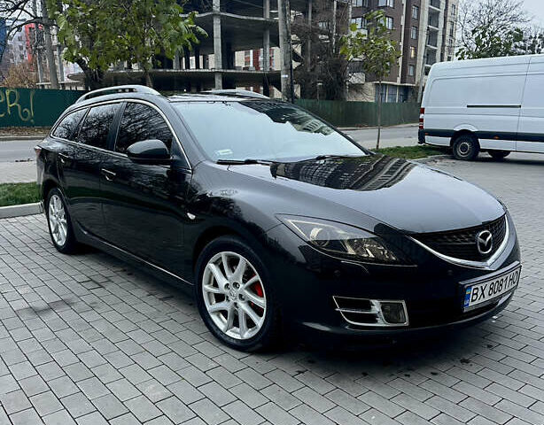 Черный Мазда 6, объемом двигателя 2 л и пробегом 235 тыс. км за 9200 $, фото 1 на Automoto.ua