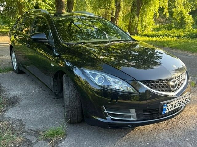 Черный Мазда 6, объемом двигателя 1.8 л и пробегом 226 тыс. км за 5400 $, фото 1 на Automoto.ua