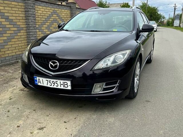 Черный Мазда 6, объемом двигателя 2 л и пробегом 175 тыс. км за 7200 $, фото 1 на Automoto.ua