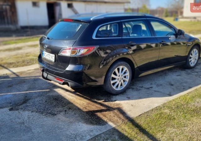 Черный Мазда 6, объемом двигателя 2.18 л и пробегом 312 тыс. км за 7000 $, фото 1 на Automoto.ua