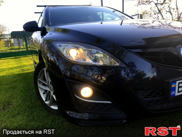 Черный Мазда 6, объемом двигателя 2.2 л и пробегом 232 тыс. км за 5700 $, фото 1 на Automoto.ua