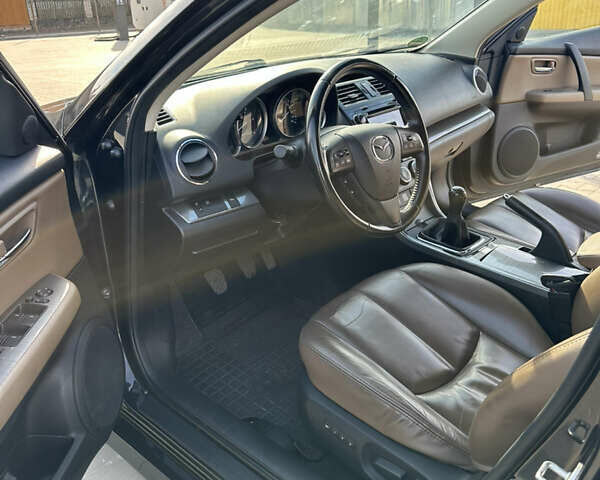 Чорний Мазда 6, об'ємом двигуна 2.2 л та пробігом 258 тис. км за 7500 $, фото 1 на Automoto.ua