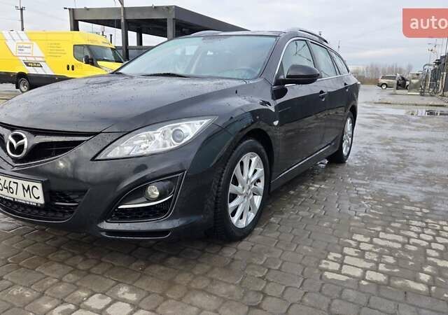 Черный Мазда 6, объемом двигателя 2.18 л и пробегом 307 тыс. км за 5900 $, фото 1 на Automoto.ua