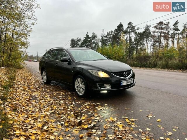 Черный Мазда 6, объемом двигателя 2 л и пробегом 300 тыс. км за 6499 $, фото 1 на Automoto.ua