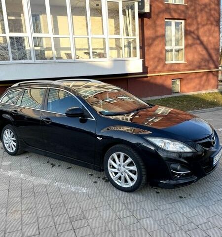 Черный Мазда 6, объемом двигателя 2.18 л и пробегом 225 тыс. км за 7700 $, фото 1 на Automoto.ua