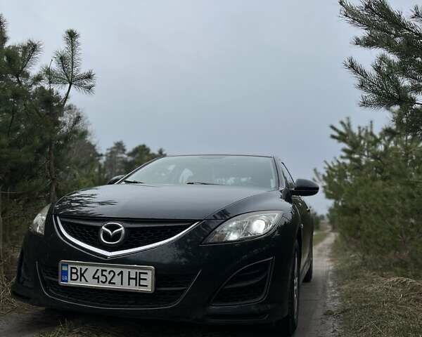 Черный Мазда 6, объемом двигателя 2.2 л и пробегом 260 тыс. км за 6800 $, фото 1 на Automoto.ua