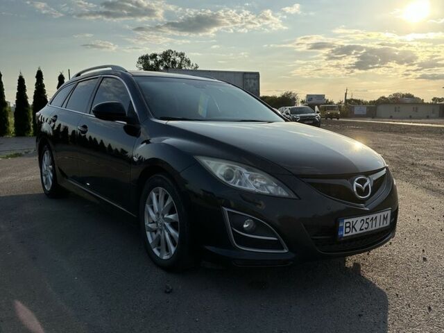 Черный Мазда 6, объемом двигателя 2.2 л и пробегом 304 тыс. км за 7500 $, фото 1 на Automoto.ua