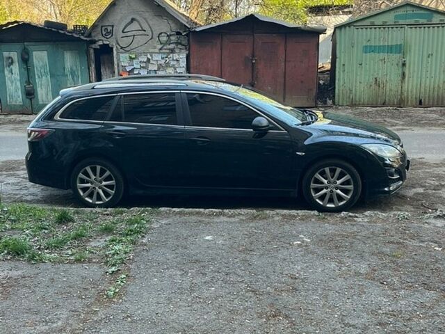 Черный Мазда 6, объемом двигателя 2.18 л и пробегом 330 тыс. км за 6650 $, фото 1 на Automoto.ua
