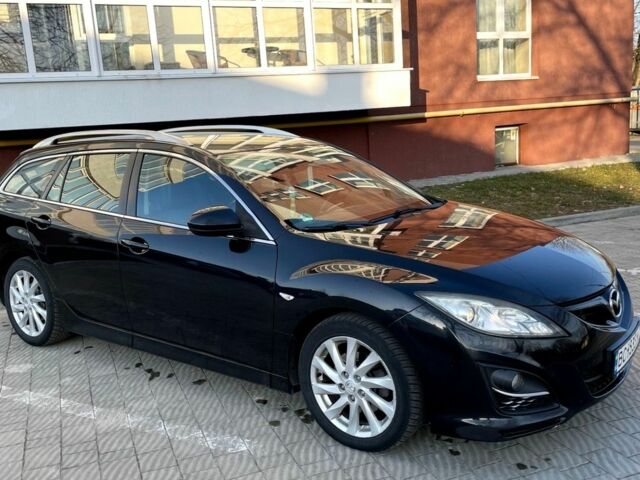 Черный Мазда 6, объемом двигателя 2.18 л и пробегом 225 тыс. км за 7700 $, фото 1 на Automoto.ua