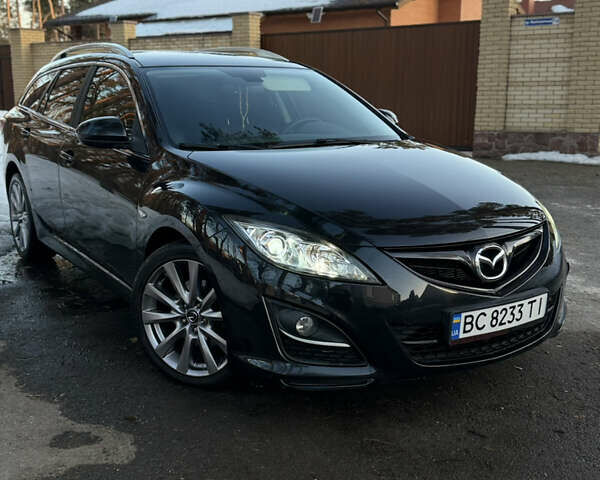 Черный Мазда 6, объемом двигателя 2.18 л и пробегом 236 тыс. км за 6800 $, фото 1 на Automoto.ua