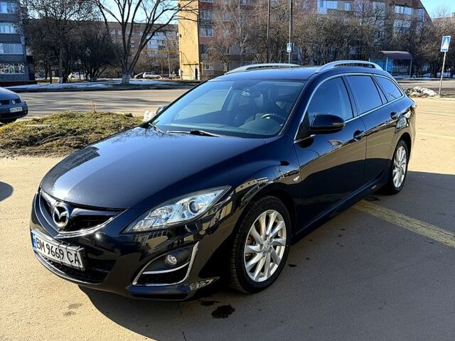 Черный Мазда 6, объемом двигателя 2.2 л и пробегом 260 тыс. км за 8300 $, фото 1 на Automoto.ua