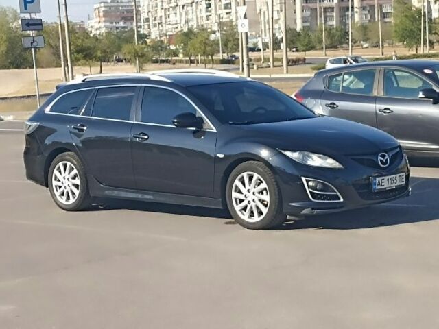 Черный Мазда 6, объемом двигателя 2.2 л и пробегом 210 тыс. км за 8000 $, фото 1 на Automoto.ua