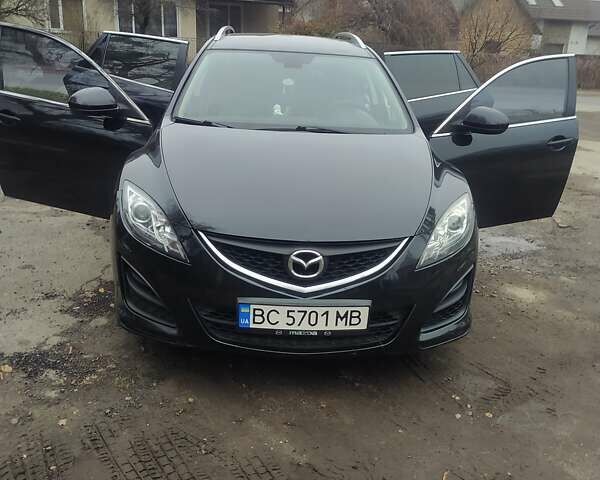 Черный Мазда 6, объемом двигателя 2.2 л и пробегом 305 тыс. км за 7200 $, фото 1 на Automoto.ua