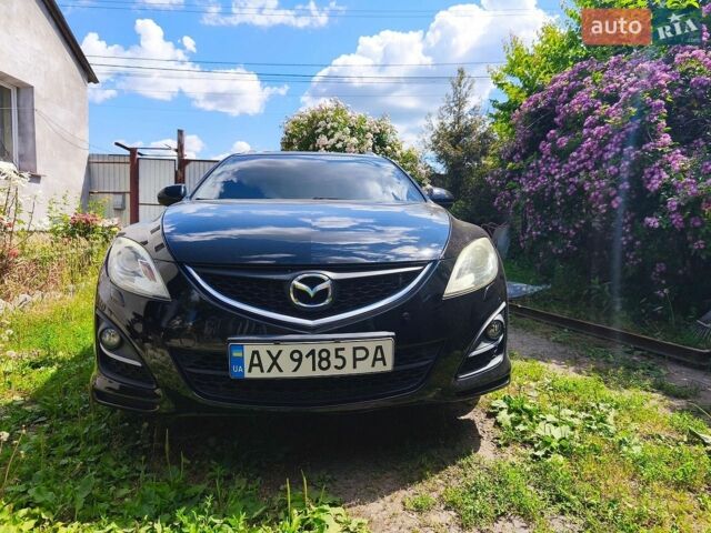 Черный Мазда 6, объемом двигателя 1.8 л и пробегом 265 тыс. км за 7000 $, фото 1 на Automoto.ua