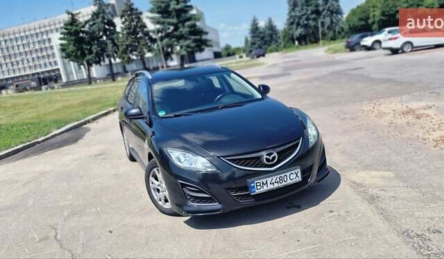 Черный Мазда 6, объемом двигателя 2.18 л и пробегом 250 тыс. км за 7500 $, фото 1 на Automoto.ua