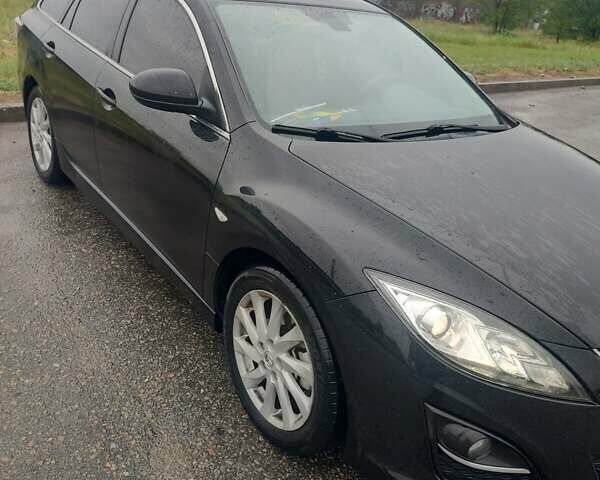 Черный Мазда 6, объемом двигателя 2.18 л и пробегом 233 тыс. км за 7200 $, фото 1 на Automoto.ua