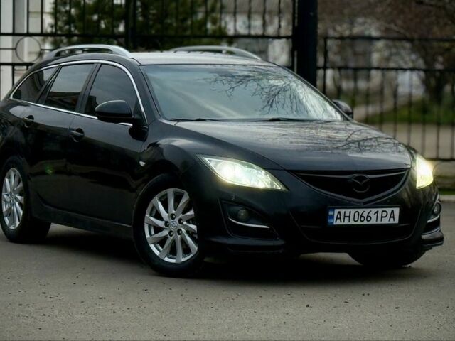 Черный Мазда 6, объемом двигателя 2.2 л и пробегом 235 тыс. км за 5800 $, фото 1 на Automoto.ua