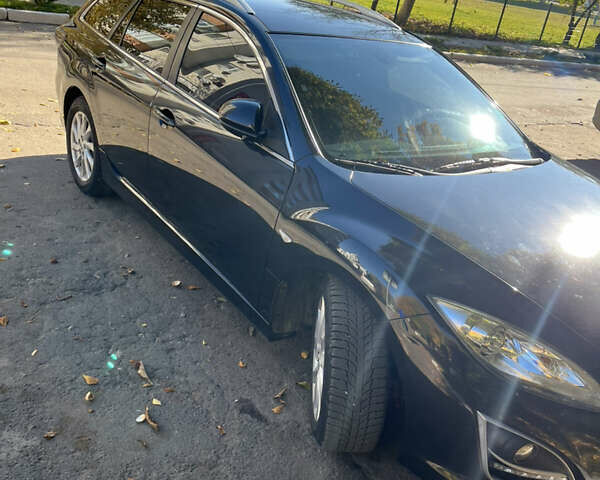 Черный Мазда 6, объемом двигателя 2.2 л и пробегом 266 тыс. км за 8500 $, фото 1 на Automoto.ua