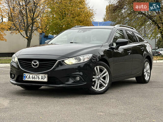 Черный Мазда 6, объемом двигателя 2.19 л и пробегом 220 тыс. км за 9300 $, фото 1 на Automoto.ua