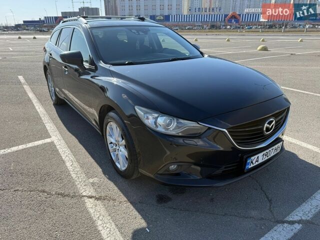 Черный Мазда 6, объемом двигателя 2.19 л и пробегом 234 тыс. км за 11000 $, фото 1 на Automoto.ua