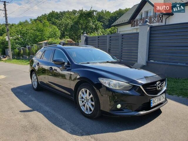 Черный Мазда 6, объемом двигателя 2.19 л и пробегом 291 тыс. км за 11800 $, фото 1 на Automoto.ua