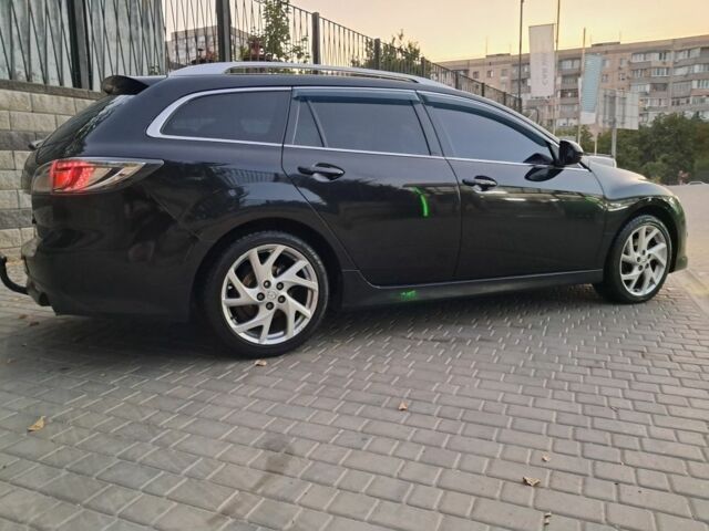 Чорний Мазда 6, об'ємом двигуна 2 л та пробігом 300 тис. км за 7006 $, фото 1 на Automoto.ua