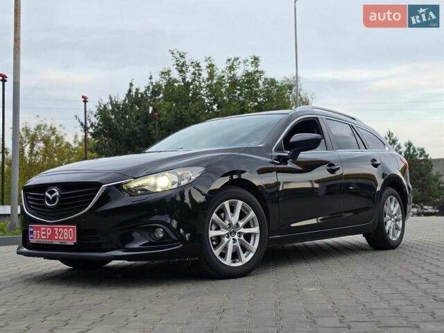 Черный Мазда 6, объемом двигателя 2.2 л и пробегом 257 тыс. км за 9850 $, фото 1 на Automoto.ua