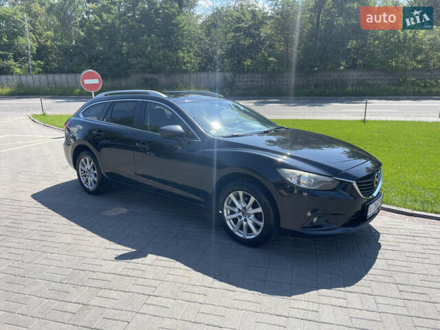 Черный Мазда 6, объемом двигателя 2.19 л и пробегом 200 тыс. км за 9000 $, фото 1 на Automoto.ua