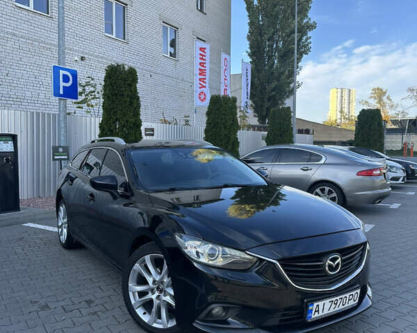 Черный Мазда 6, объемом двигателя 2.18 л и пробегом 256 тыс. км за 12200 $, фото 1 на Automoto.ua