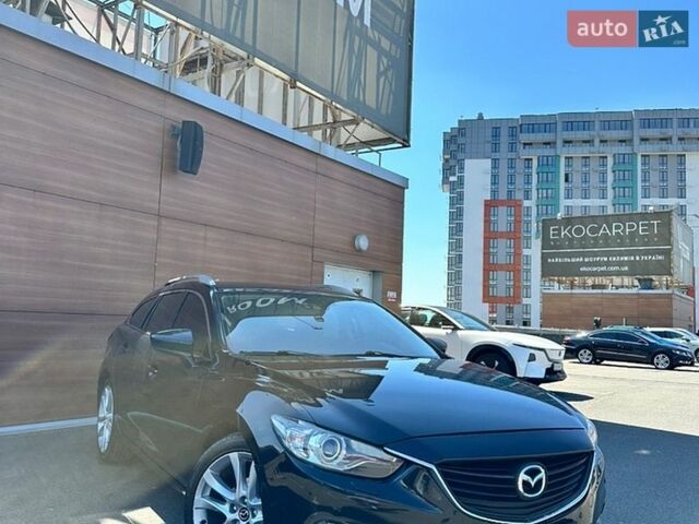 Черный Мазда 6, объемом двигателя 2.18 л и пробегом 269 тыс. км за 11700 $, фото 1 на Automoto.ua