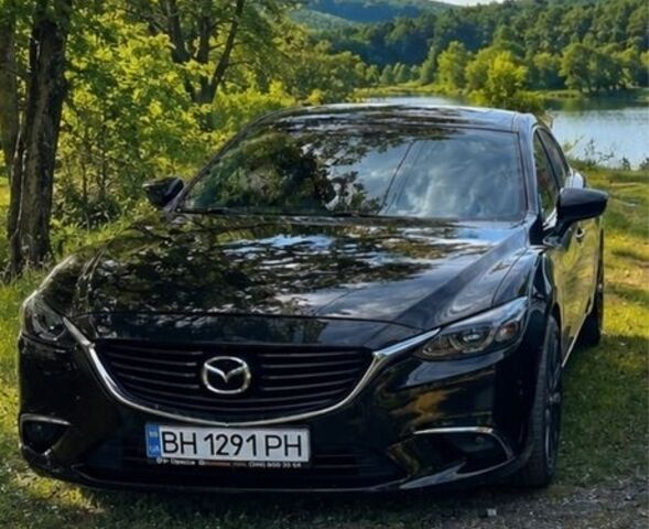 Черный Мазда 6, объемом двигателя 2.5 л и пробегом 210 тыс. км за 13832 $, фото 1 на Automoto.ua