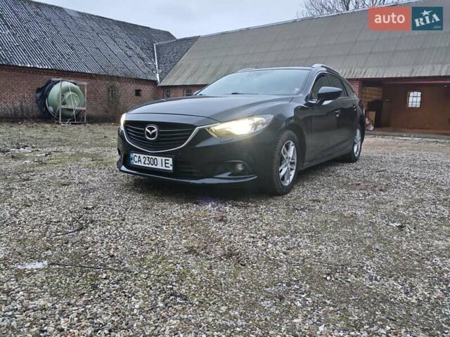 Черный Мазда 6, объемом двигателя 2.18 л и пробегом 230 тыс. км за 9800 $, фото 1 на Automoto.ua