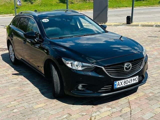 Черный Мазда 6, объемом двигателя 2.18 л и пробегом 280 тыс. км за 10500 $, фото 1 на Automoto.ua