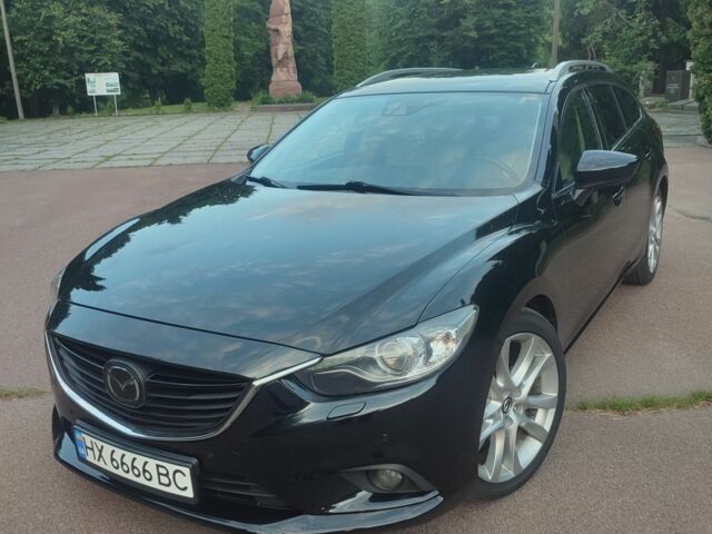 Черный Мазда 6, объемом двигателя 2.2 л и пробегом 265 тыс. км за 10900 $, фото 1 на Automoto.ua