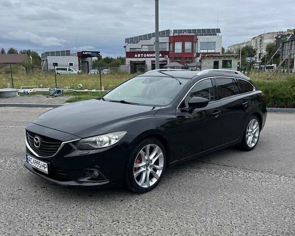 Черный Мазда 6, объемом двигателя 2.19 л и пробегом 267 тыс. км за 10700 $, фото 1 на Automoto.ua