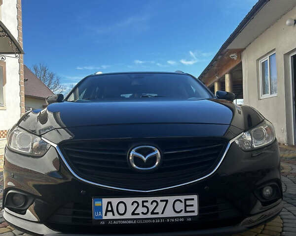 Черный Мазда 6, объемом двигателя 2.19 л и пробегом 223 тыс. км за 11000 $, фото 1 на Automoto.ua