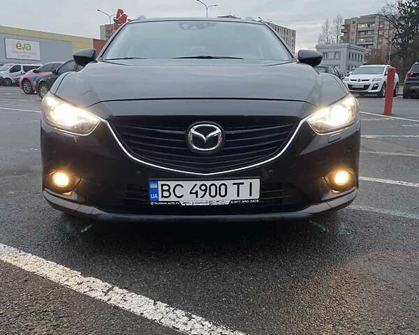 Черный Мазда 6, объемом двигателя 2.19 л и пробегом 300 тыс. км за 12200 $, фото 1 на Automoto.ua