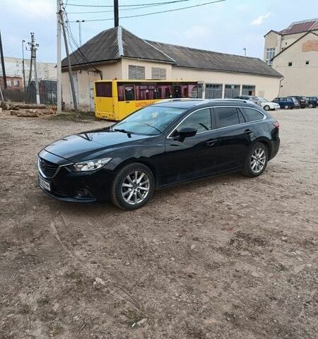 Черный Мазда 6, объемом двигателя 2.19 л и пробегом 250 тыс. км за 11500 $, фото 1 на Automoto.ua
