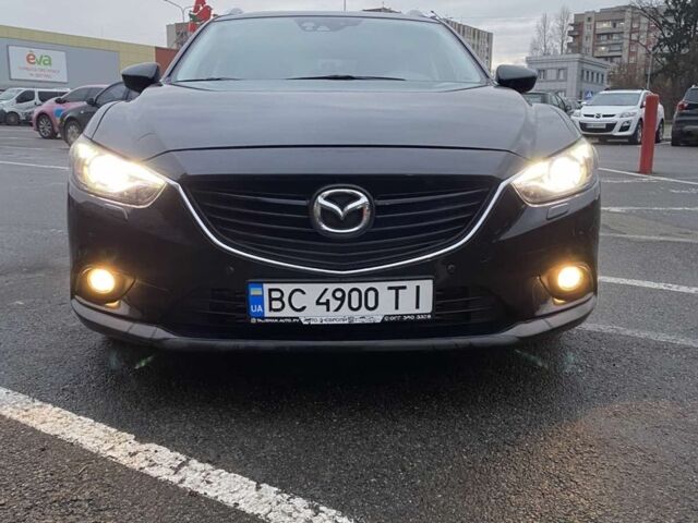 Черный Мазда 6, объемом двигателя 2.19 л и пробегом 300 тыс. км за 12200 $, фото 1 на Automoto.ua