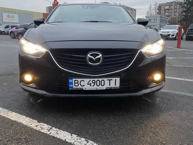 Черный Мазда 6, объемом двигателя 2.19 л и пробегом 300 тыс. км за 12200 $, фото 1 на Automoto.ua