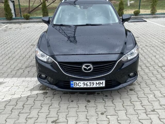 Черный Мазда 6, объемом двигателя 2.2 л и пробегом 250 тыс. км за 10500 $, фото 1 на Automoto.ua