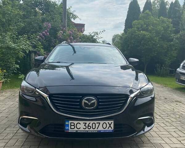 Черный Мазда 6, объемом двигателя 2.19 л и пробегом 270 тыс. км за 11100 $, фото 1 на Automoto.ua