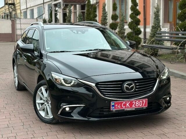 Черный Мазда 6, объемом двигателя 2.19 л и пробегом 177 тыс. км за 14550 $, фото 1 на Automoto.ua