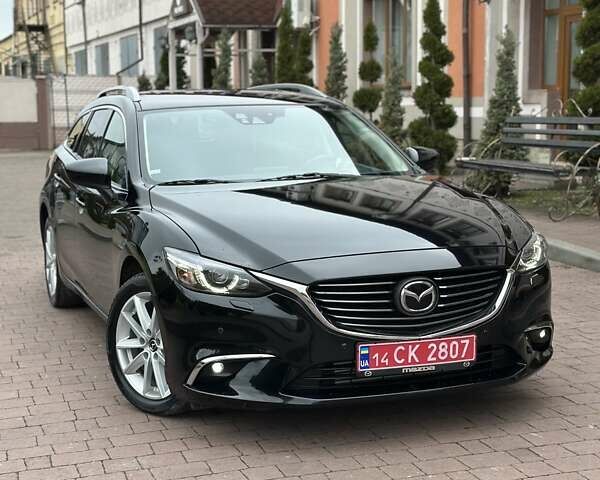 Черный Мазда 6, объемом двигателя 2.19 л и пробегом 177 тыс. км за 15550 $, фото 1 на Automoto.ua