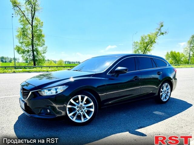 Черный Мазда 6, объемом двигателя 2.2 л и пробегом 67 тыс. км за 15500 $, фото 1 на Automoto.ua