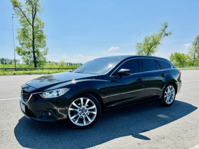Черный Мазда 6, объемом двигателя 2.2 л и пробегом 67 тыс. км за 15500 $, фото 1 на Automoto.ua