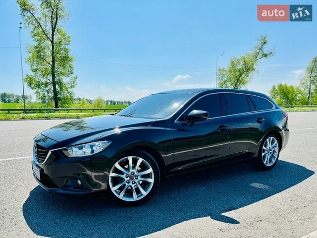Черный Мазда 6, объемом двигателя 2.2 л и пробегом 67 тыс. км за 15500 $, фото 1 на Automoto.ua